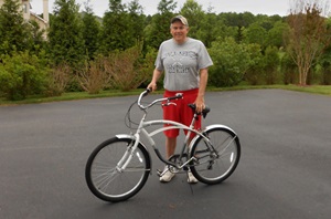 Christopher with his bicycle